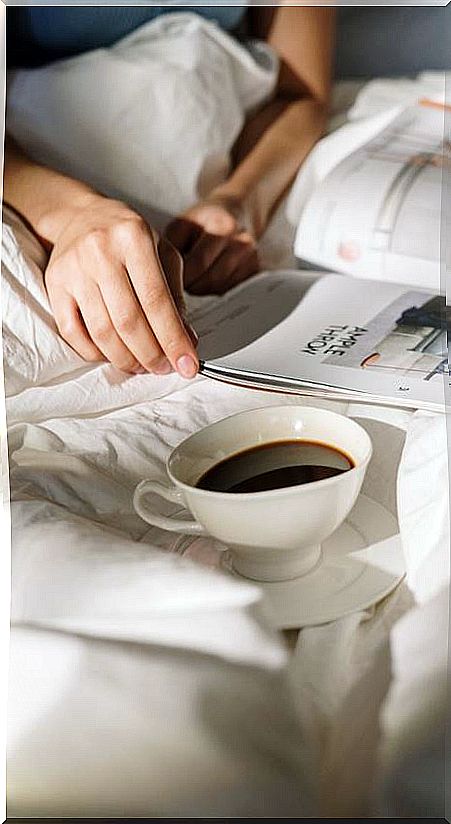 Woman hands and cup of coffee