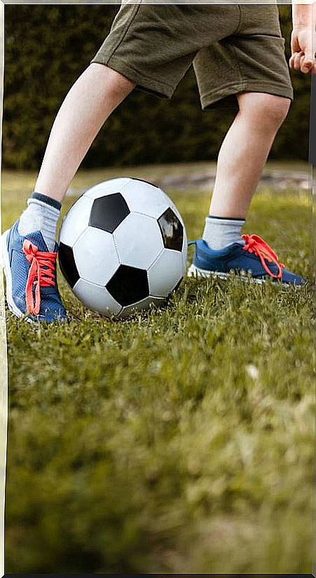 Boy playing soccer